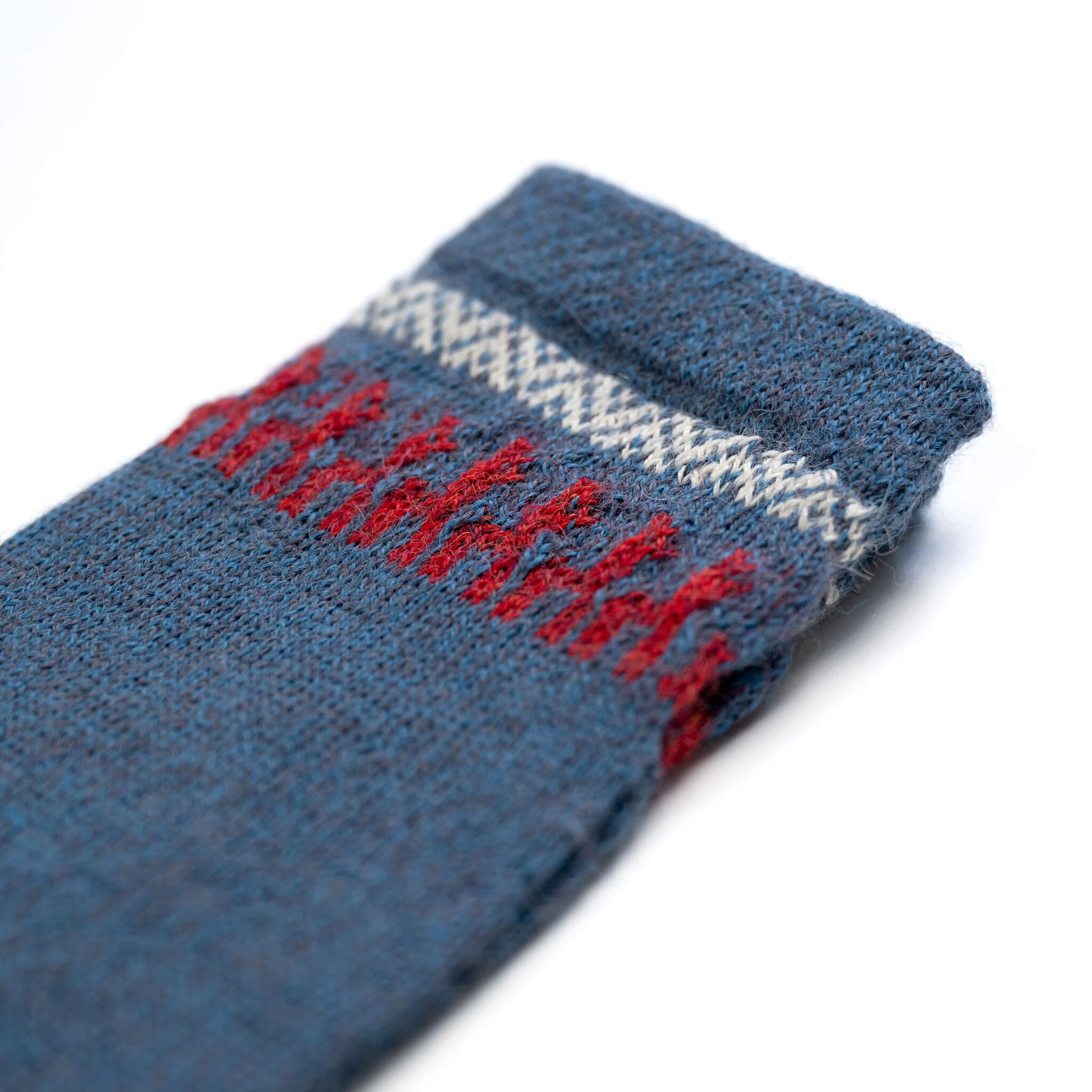 Alpaka Socken 100 Prozent für Damen und Herren von Alpakin in blau mit Alpaka-Motiv